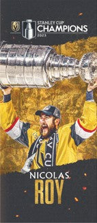 Hockey player in a yellow jersey celebrating with the Stanley Cup Championship trophy