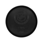 Black hockey puck with NHL logo, part of Vegas Golden Knights merchandise