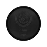 Black hockey puck with NHL logo, part of Vegas Golden Knights merchandise