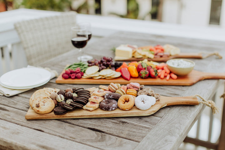 Wooden Vegas Golden Knights Artisan Charcuterie Board with assorted cheese, fruits, and desserts