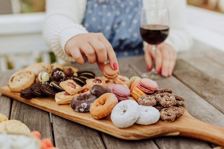 Wooden charcuterie board filled with delicious cookies and pastries for Vegas Golden Knights fans