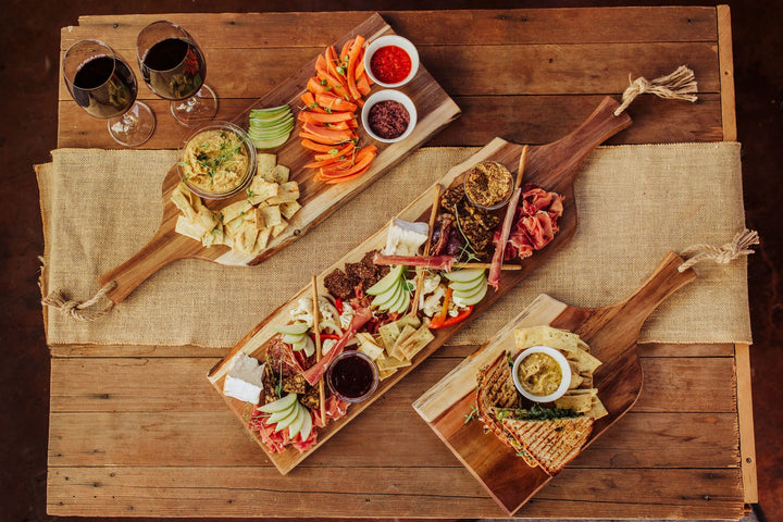 Charcuterie board featuring meats and cheeses on Vegas Golden Knights Artisan Acacia Board