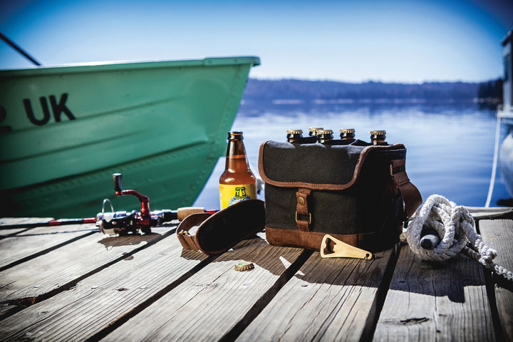 Fishing tackle box with Vegas Golden Knights beer caddy and equipment on dock