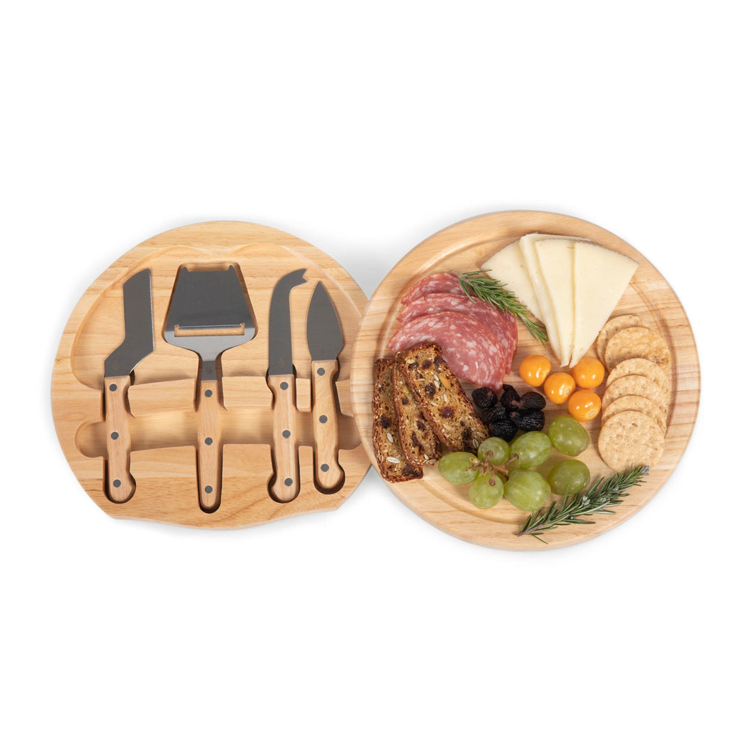 Circular wooden cheese board with utensils and gourmet selection in Circo Cheese set