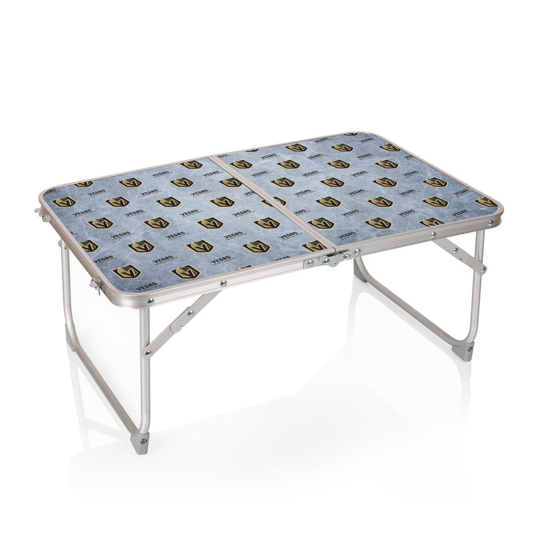 Light blue portable table with cartoon avocado designs, Vegas Golden Knights Concert Table