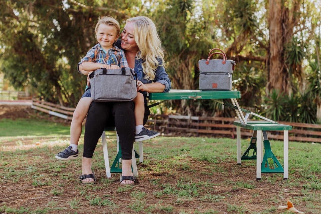 Woman and child enjoying a picnic with Vegas Golden Knights lunch bag cooler