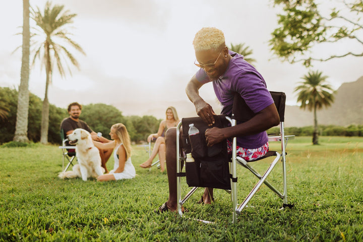 Folding camping chair with a person seated, featuring Vegas Golden Knights design