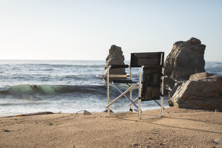 Director’s chair on sandy beach with ocean, featuring Vegas Golden Knights Sports Chair