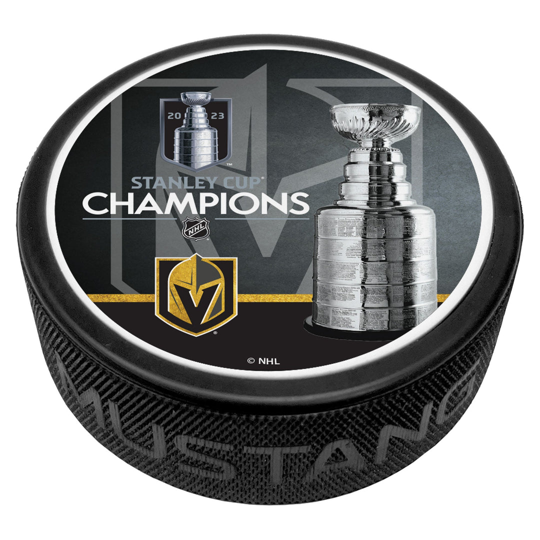 Hockey puck commemorating Vegas Golden Knights Stanley Cup Champions trophy design