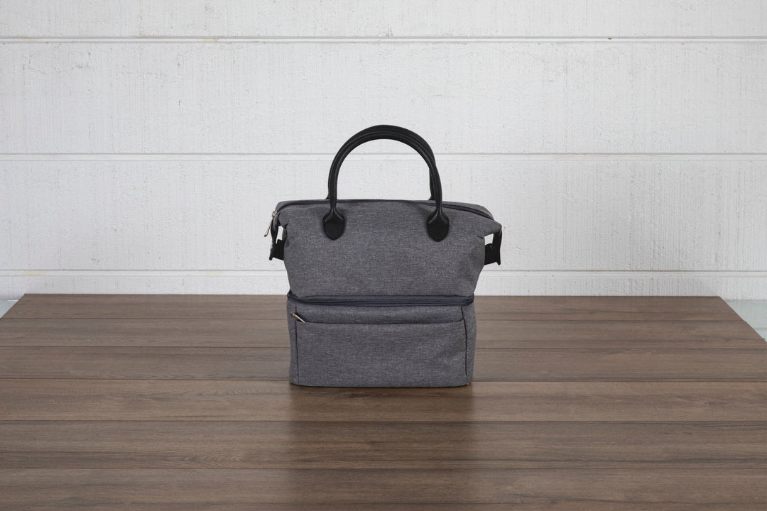 Gray canvas Urban Lunch Bag cooler with black handles on wooden surface