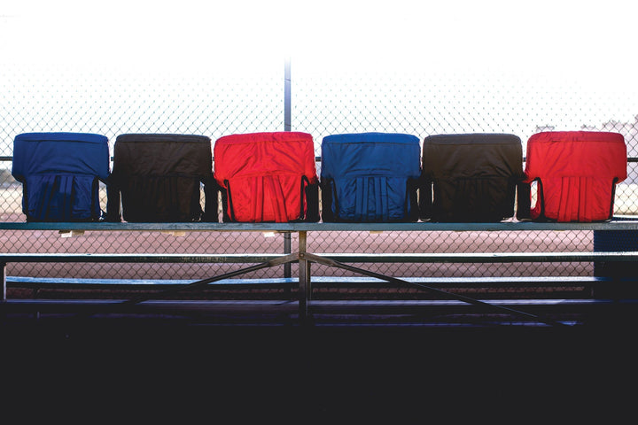 Row of Vegas Golden Knights stadium seats in blue, black, and red colors